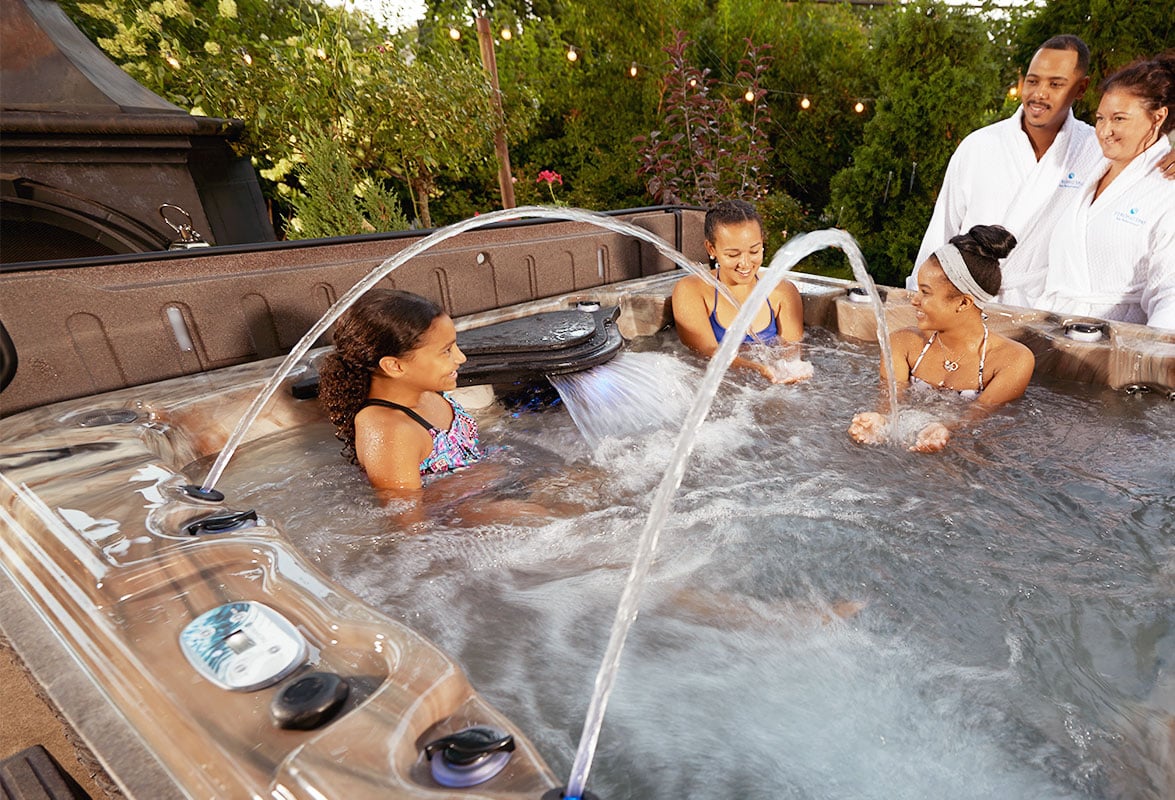 Madrid 60-Family Enjoying Their Strong Spas Hot Tub 2 - image